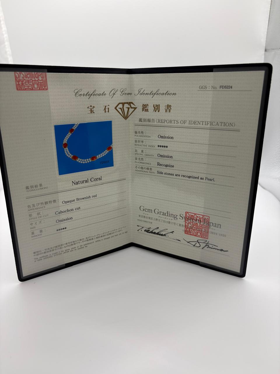 K 18 NATURAL CORAL WITH GGS CERTIFICATE