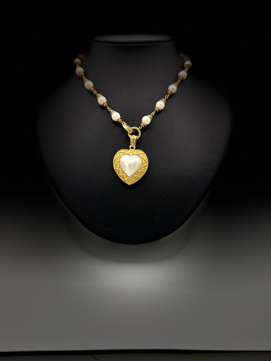 HALF HEART SHAPE PEARL 67.57 GRMS AND K18 WITH GGS CERTIFICATE
