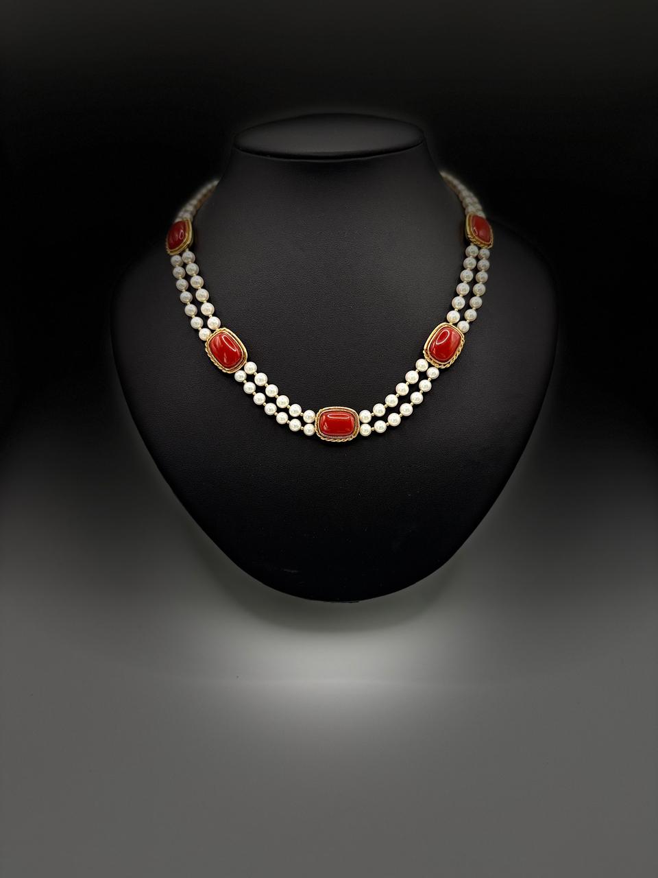 K 18 NATURAL CORAL WITH GGS CERTIFICATE