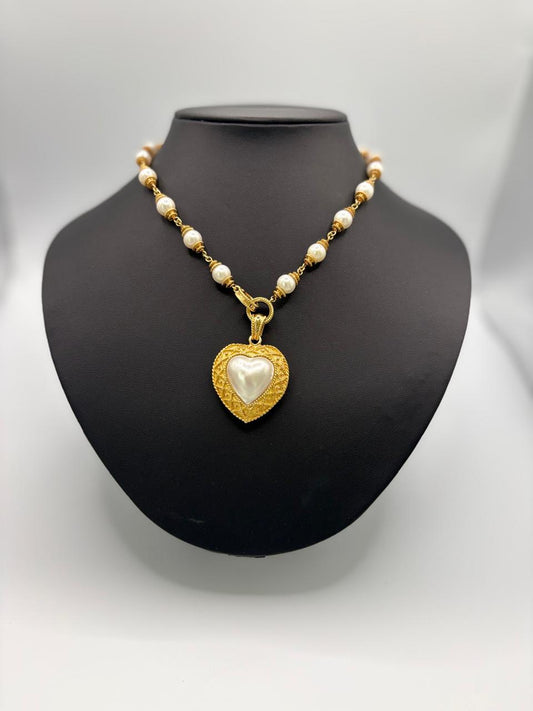 HALF HEART SHAPE PEARL 67.57 GRMS AND K18 WITH GGS CERTIFICATE