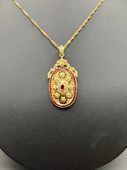 K 18 Ruby CHAIN & PENDANT Total Wgt - 14.60 Grms